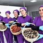A Woman entrepreneur creates jobs with dried fruits for other women
