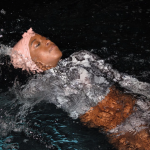 MEET THE BRITISH WOMAN CREATING WATERPROOF SCARVES FOR BLACK SWIMMERS