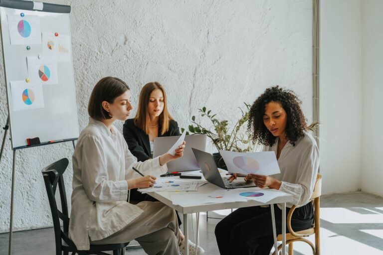 Professional women writing their professional bio