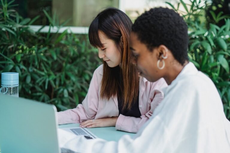 How to Maximize a Media Feature and Create More Opportunities Two professional women learning how to maximize a media feature
