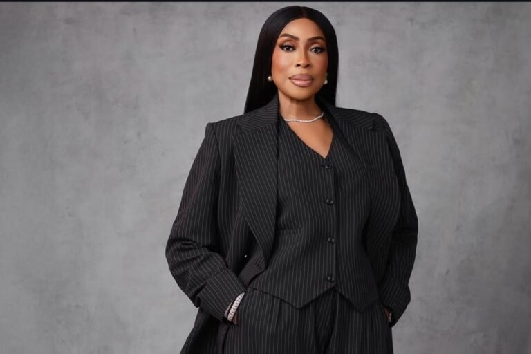 How Mo Abudu Built Platforms for African Stories to Reach the World Mo Abudu in a black pinstripe suit beside a headline about her work bringing African stories to global audiences.